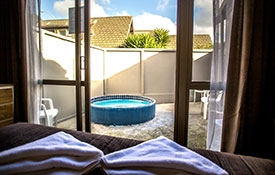sliding doors lead out to an private courtyard